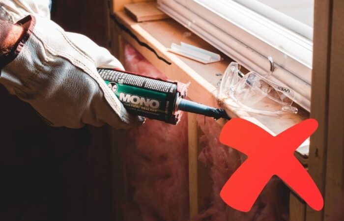 pose de silicone sur de l'isolant